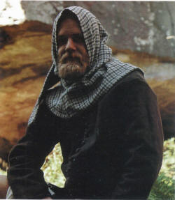 крестьянин в шапероне