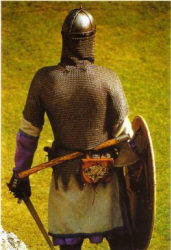 викинг с мечом и топором