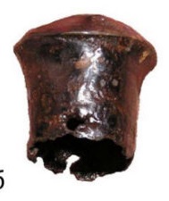 Навершие: анфас (а); профиль (б)