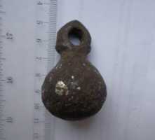 находка древнерусского кистеня ташуированного серебром