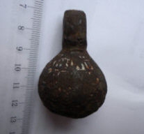 находка древнерусского кистеня ташуированного серебром