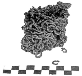 Фрагмент кольчуги, найденной вместе со шлемом, до реставрации