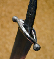 Сабельное перекрестье на мече