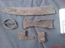 обломок лезвия, пряга, тесло, наконечник ножен и обоймица сабли
