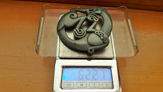 Скифская бляшка: Свернувшаяся калачиком пантера