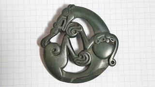 Скифская бляшка: Свернувшаяся калачиком пантера