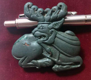 Скифская бляха изображающая фантастическое животное