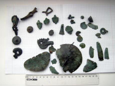 Набор бронзовых украшений скифской лашадиной сбруи