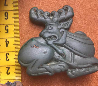 Скифская бляха изображающая фантастическое животное