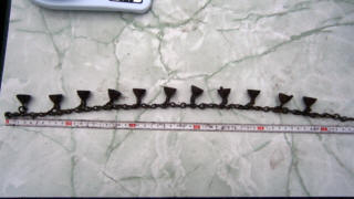 Погрудные колокольчики на цепи