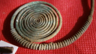 Спиральные завитки славянских височных колец