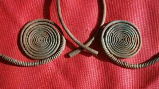 Спиральные окончания славянских височных колец